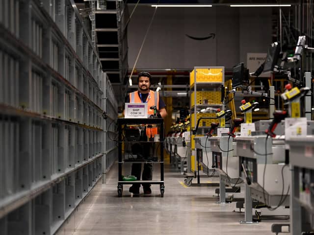 Tour of new £500m Amazon fulfilment centre on outskirts of Leeds. Workers pictured in the factory. Picture taken by Yorkshire Post Photographer Simon Hulme