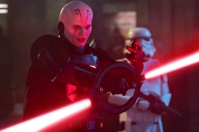 Sung Kang plays the Grand Inquisitor, leader of this band of Jedi Hunters. Photo: Disney+ via AP.