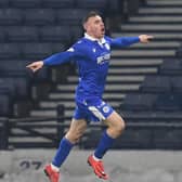 Queen of the South's Connor Shields celebrates his goal against Queens Park in the previous round of the Scottish Cup.  Photo by Ross MacDonald / SNS Group
