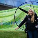 Paramotorist Sacha Dench with her adapted electric paramotor at Glasgow Science Centre.