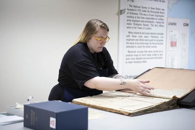 National Library of Scotland conservator Claire Hutchison is working to try to safeguard the most at-risk newspapers in its vast collections.