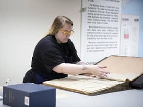 National Library of Scotland conservator Claire Hutchison is working to try to safeguard the most at-risk newspapers in its vast collections.