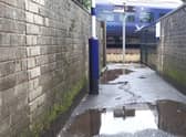 Flooding regularly covers this station entrance path in Glasgow. Picture: The Scotsman