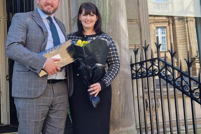 Head of Road Traffic & Criminal Law Kris Buchanan with Stephanie Grieve, Associate Director outside Scullion LAW's Hamilton Office