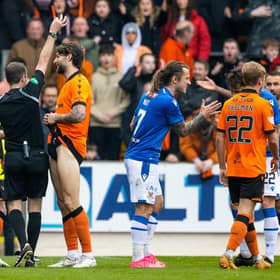 Dundee United's Charlie Mulgrew is shown a red card during the 1-0 defeat at St Johnstone. (Photo by Alan Harvey / SNS Group)