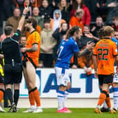 Dundee United's Charlie Mulgrew is shown a red card during the 1-0 defeat at St Johnstone. (Photo by Alan Harvey / SNS Group)