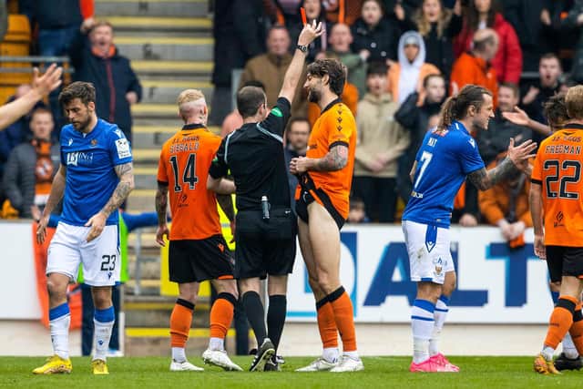 Dundee United's Charlie Mulgrew is shown a red card during the 1-0 defeat at St Johnstone. (Photo by Alan Harvey / SNS Group)