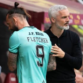 Dundee Utd's Steven Fletcher shakes hands with manager Jim Goodwin after being substituted in the 3-2 defeat to Motherwell that confirmed the club's relegation. (Photo by Craig Foy / SNS Group)