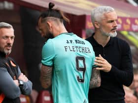 Dundee Utd's Steven Fletcher shakes hands with manager Jim Goodwin after being substituted in the 3-2 defeat to Motherwell that confirmed the club's relegation. (Photo by Craig Foy / SNS Group)