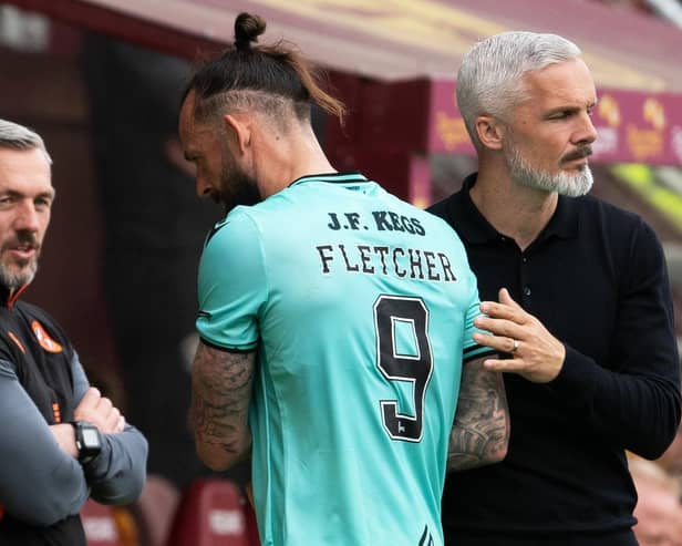 Dundee Utd's Steven Fletcher shakes hands with manager Jim Goodwin after being substituted in the 3-2 defeat to Motherwell that confirmed the club's relegation. (Photo by Craig Foy / SNS Group)