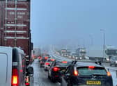 Traffic at a standstill on the M62 motorway near Kirklees, West Yorkshire, due to heavy snow in the area. Picture date: Friday March 10, 2023.
