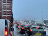 Traffic at a standstill on the M62 motorway near Kirklees, West Yorkshire, due to heavy snow in the area. Picture date: Friday March 10, 2023.