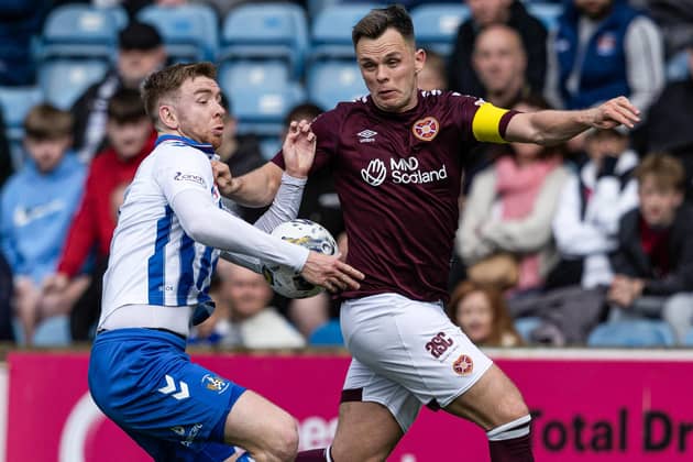Hearts' Lawrence Shankland claims for a handball against Kilmarnock's Stuart Findlay during the cinch Premiership match at Rugby Park, on April 27, 2024, in Kilmarnock, Scotland.  (Photo by Craig Foy / SNS Group)