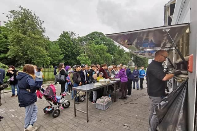 Queues at Siobhan's Trust pizza vans in Ukraine.