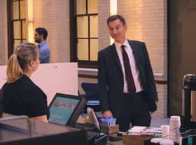 Jeremy Hunt channels Mr Bean as he orders a coffee in a new Treasury video about inflation (Picture: HM Treasury)