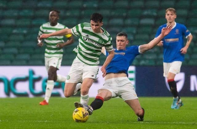 Mathew Anderson battles with Cole McKinnon during a Scottish Lowland League match between Celtic B and Rangers B at Celtic Park, on April 12, 2022, in Glasgow, Scotland. (Photo by Craig Foy / SNS Group)