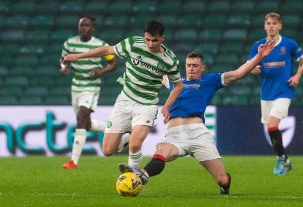 Mathew Anderson battles with Cole McKinnon during a Scottish Lowland League match between Celtic B and Rangers B at Celtic Park, on April 12, 2022, in Glasgow, Scotland. (Photo by Craig Foy / SNS Group)