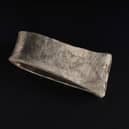 A Scandinavian-style silver arm ring found in the Viking-era Galloway Hoard with the runic inscription for the name Egbert, an Anglo Saxon name common in the kingdom of Northumbria. Picture: National Museums Scotland