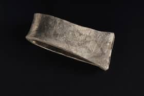 A Scandinavian-style silver arm ring found in the Viking-era Galloway Hoard with the runic inscription for the name Egbert, an Anglo Saxon name common in the kingdom of Northumbria. Picture: National Museums Scotland
