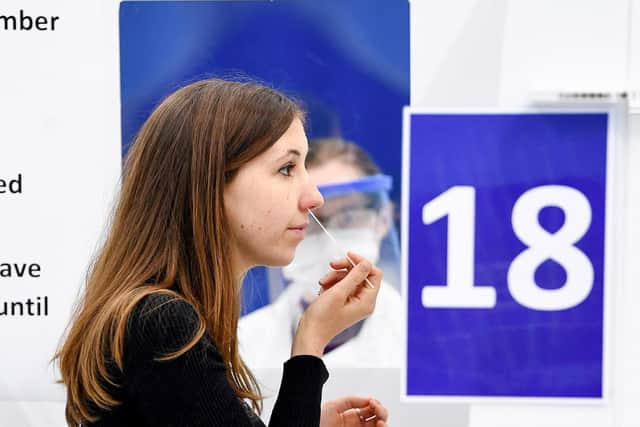 A student at St Andrew University participates in testing of a lateral flow antigen test facility in November 2020. Picture: Jeff J Mitchell/Getty Images