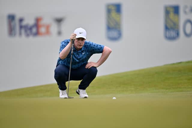 MacIntyre lines up a putt on the 17th green during the final round.