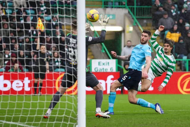 Celtic's Jota has an acrobatic attempt at goal ruled out for offside during a Cinch Premiership match between Celtic and Dundee at Celtic Park, on February 20, 2022, in Glasgow, Scotland. (Photo by Craig Williamson / SNS Group)