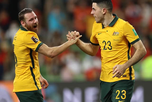 Celtic midfielder celebrates with former Hibs forward Martin Boyle after the playmaker put Australia 2-0 up against Vietnam.