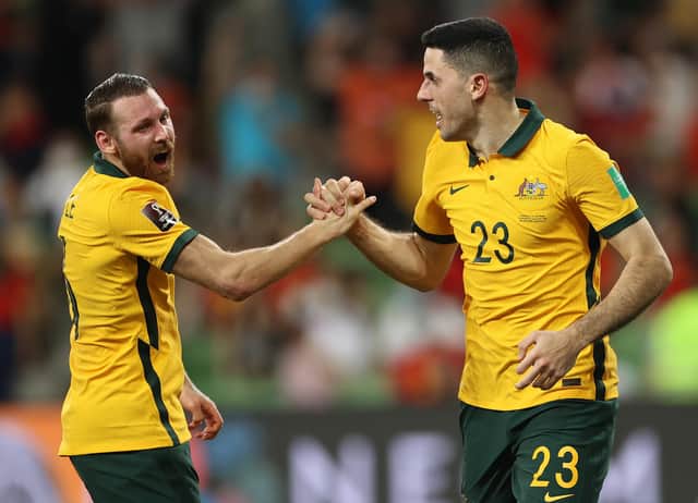 Celtic midfielder celebrates with former Hibs forward Martin Boyle after the playmaker put Australia 2-0 up against Vietnam.