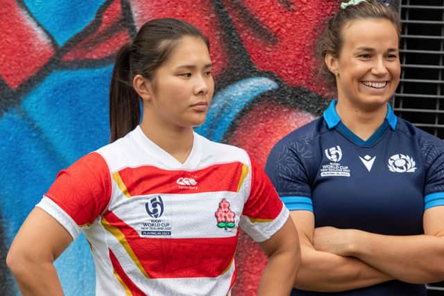 Scotlands's Rachel Malcolm (right) with Japan's Saki Minami at team captains photocall at Eden Park, Auckland ahead of the Women's Rugby World Cup. (Photo by IVAN TARLTON/AFP via Getty Images)