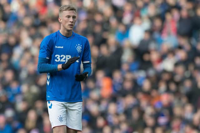 Ross McCrorie is sent to seal a deal going from Rangers to Aberdeen on an initial loan deal that could be made permanent at the end of the campaign. Picture: SNS