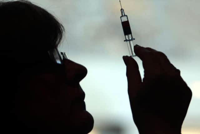 Scotland's largest health board has apologised for any "distress and anxiety" caused over failures with its flu vaccination programme.