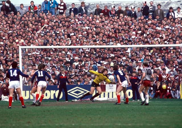 Dundee's Albert Kidd scores his second goal in the famous 2-0 win over Hearts in May 1986 that denied the Tynecastle men the title and sent it Celtic's way. The Australia-based former striker met with Ange Postecoglou last week and the Parkeahd club's manager reveals his old associate from his homeland isn't the only Dens Park player that afternoon who lays a claim to being pivotal to the most extraordinary title turnaround. (Photo by SNS Group).