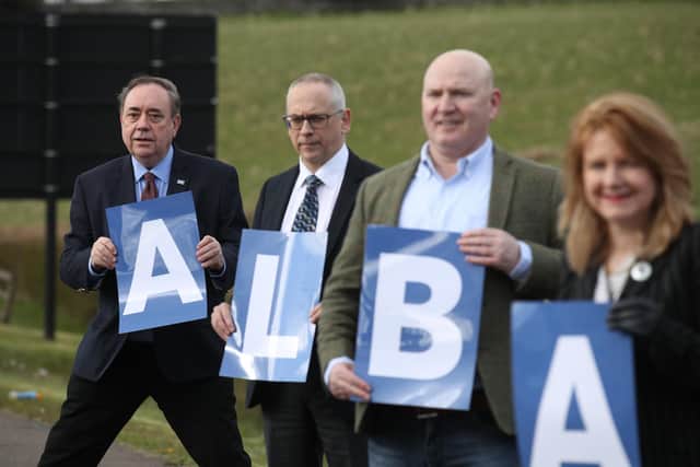 ALBA Party leader Alex Salmond(L) alongside the Mid Scotland and Fife candidates Jim Eadie, Neale Hanvey MP and and Eva Comrie during a photo call during the Scottish Parliamentary election campaign.