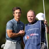 Thorbjorn Olesen of Denmark reacts on the 18th green with caddie Dom Bott during the third round of the Betfred British Masters hosted by Danny Willett at The Belfry. Picture: Richard Heathcote/Getty Images.