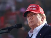 Donald Trump promised to shake up Washington and eventually tried to end democracy in the US (Picture: Scott Olson/Getty Images)