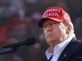 Donald Trump promised to shake up Washington and eventually tried to end democracy in the US (Picture: Scott Olson/Getty Images)
