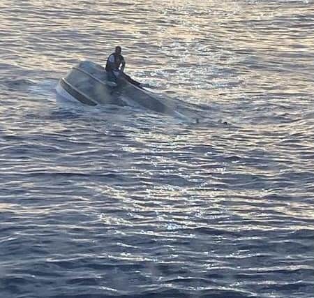 Officials say that the alarm was raised when a survivor clinging to the overturned vessel was rescued by a passing craft east of the state’s Fort Pierce Inlet.