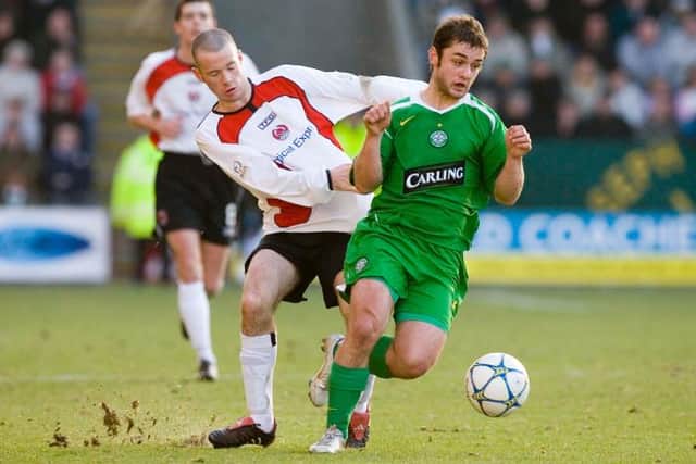 Shaun Maloney (right) holds off Clyde's Eddie Malone in one of the competition's shocks in 2006.