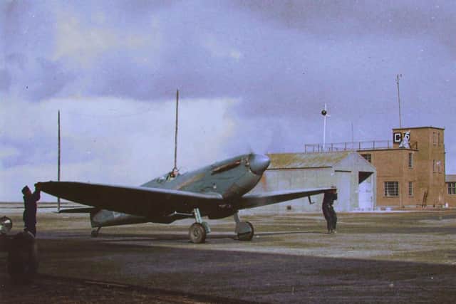 A Spitfire AA810 at RAF Wick on the 29th January, 1942. Just five weeks later this very aircraft would be shot down with  Flt Lt Sandy Gunn at the controls. (Tomlinson family/Colour by RJM.