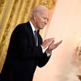 US President Joe Biden claps as he hosts a reception to celebrate Diwali in the East Room of the White House in Washington, DC, on October 24, 2022. (Photo by Brendan SMIALOWSKI / AFP) (Photo by BRENDAN SMIALOWSKI/AFP via Getty Images)