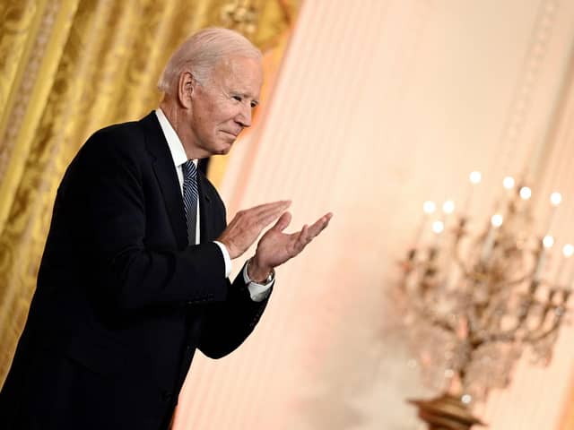 US President Joe Biden claps as he hosts a reception to celebrate Diwali in the East Room of the White House in Washington, DC, on October 24, 2022. (Photo by Brendan SMIALOWSKI / AFP) (Photo by BRENDAN SMIALOWSKI/AFP via Getty Images)