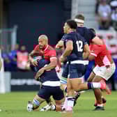 Afusipa Taumoepeau of Tonga tackles Jamie Ritchie of Scotland during the World Cup match in Nice.