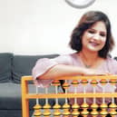 Company founder Rashmi Mantri with an abacus.