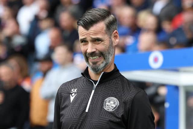 Motherwell manager Stuart Kettlewell watches on as his team went down to Rangers.