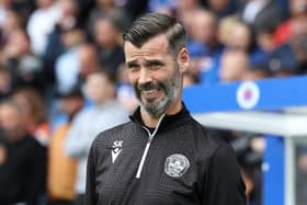 Motherwell manager Stuart Kettlewell watches on as his team went down to Rangers.
