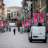 An almost empty Buchanan Street in the centre of Glasgow as people observe the spring 2020 lockdown. Non-essential stores were closed again more recently under tighter restrictions, hammering trade. Picture: John Devlin
