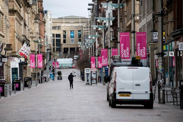 An almost empty Buchanan Street in the centre of Glasgow as people observe the spring 2020 lockdown. Non-essential stores were closed again more recently under tighter restrictions, hammering trade. Picture: John Devlin