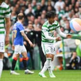 Beachballs blew from the stands onto the pitch, leading Celtic midfielder to Reo Hatate to intervene with one inflatable (Photo by Craig Foy / SNS Group)