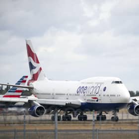 The parent company of British Airways expects its flight capacity from October to December to be no more than 30 per cent of what it was over the same period last year. This is down from its previous guidance. Picture: Steve Parsons/PA Wire
