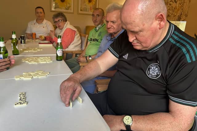 Residents at HC-One Scotland’s Eastbank Care Home participating in dominoes tournament during Care Home Open Week 2025